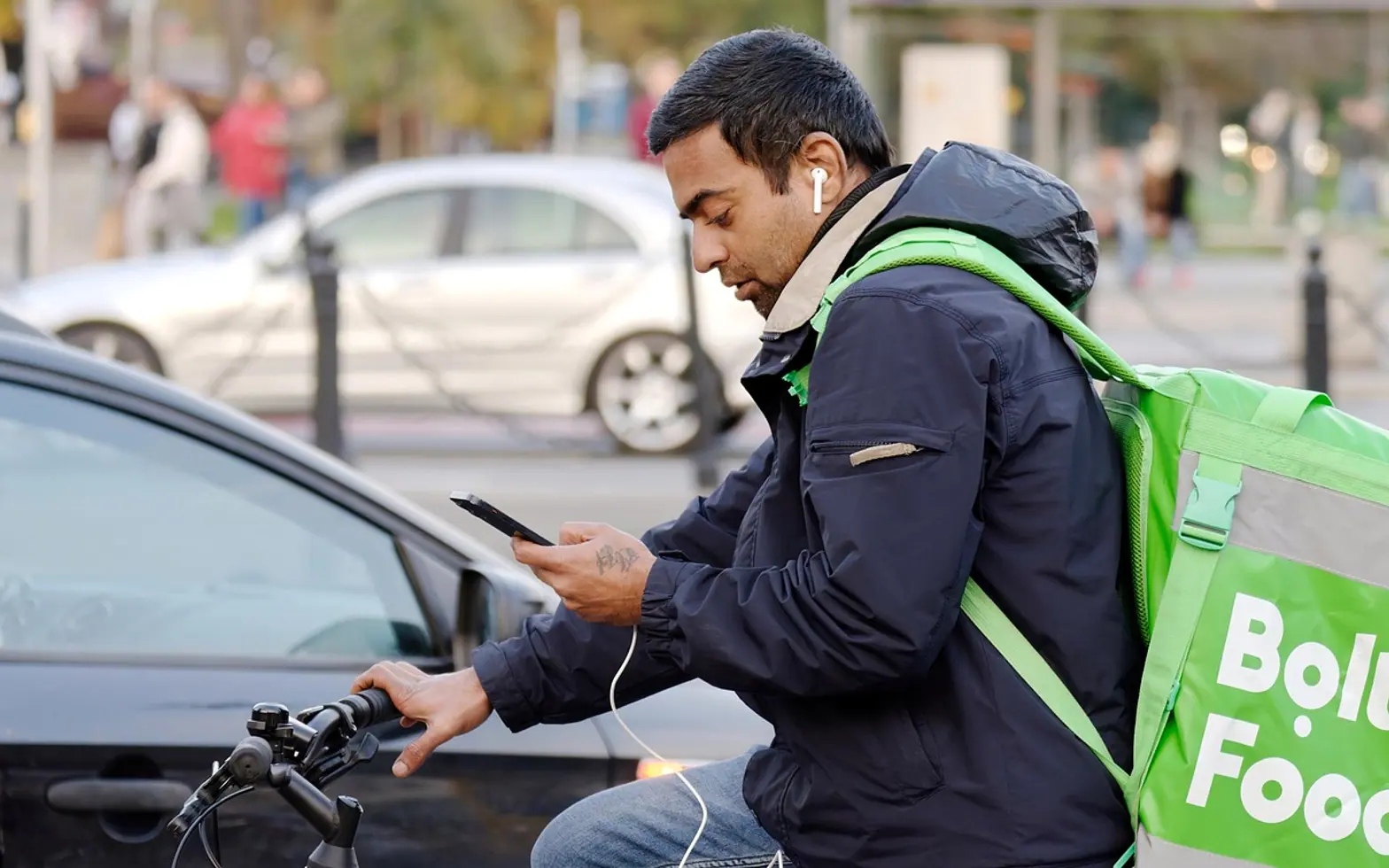 Man, bicycle and food delivery