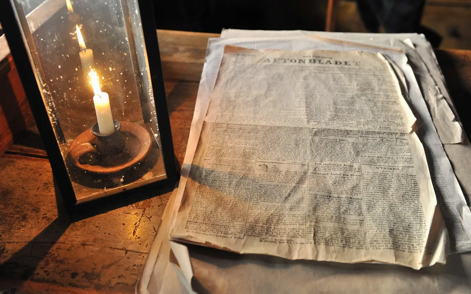 Candle, journal and press